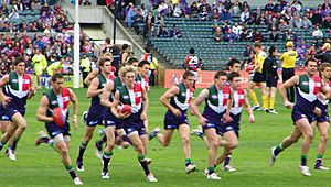 Fremantle players warming up prior to a game