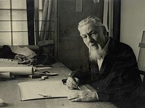 Plečnik seated at a drawing table