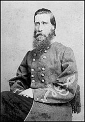 John Bell Hood, in military uniform, sitting