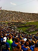 The Band of the Fighting Irish spells out ND through which the Notre Dame Fighting Irish Football Team runs onto the field