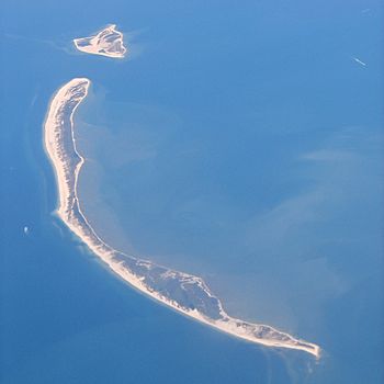 Aerial photograph of a narrow sandy island