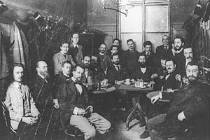 THEODOR HERZL (SEATED AT CENTER OF TABLE) WITH MEMBERS OF THE ZION ORGANIZATION IN THE LUBER CAFE IN VIENNA, 1896. תאודור הרצל עם חברי אגודת ציון בקפה לובר בווינה. 1896