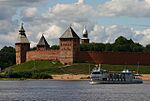 A red brick fortress above a river