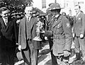 Calvin Coolidge receiving statue of Boy Scout outside the White House 1927
