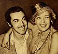 Cesar Romero and Phyllis Brooks