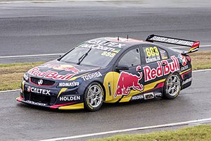 Craig Lowndes in Red Bull Racing Australia car 888, departing pitlane during the V8 Supercars Test Day
