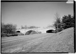 EASTERN VIEW OF WATERGATE AT CENTER AND THE ROCK CREEK AND POTOMAC PARKWAY RAMP AT LEFT. VIEW TAKEN FROM NORTHERN RAILING OF MEMORIAL BRIDGE. - Arlington Memorial Bridge, Boundary HAER DC,WASH,563-B-2.tif