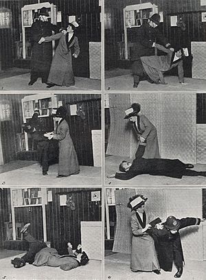 Garrud demonstrating jujutsu on her husband dressed as a police officer