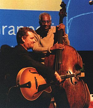 Martin Taylor and Coleridge Goode at launch of the Stephane Grappelli DVD, London, 2002