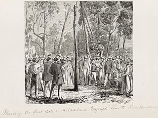 Planting the first pole on the Overland Telegraph line to Carpentaria