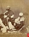 Rajput men playing the game of Puchesee; a photo by Eugene Clutterbuck Impey, early 1860