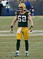 A photo of Clay Matthews III in uniform on the field waiting for the play to begin.