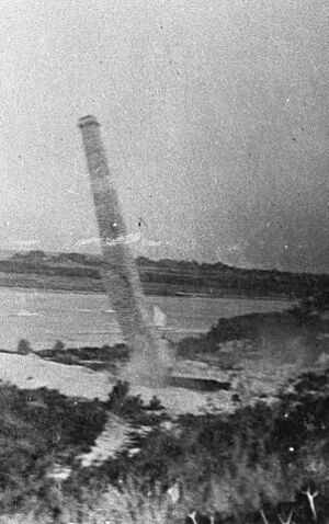Brickworks chimney falling, Te Atatu Peninsula (cropped)