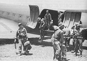 DOBODURA AIRSTRIP. 41st Division troops arriving from Port Moresby, 4 February 1943