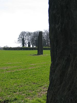 a line of three large standing stones
