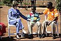 Laura Bush talks with African boy
