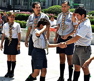 Leaders welcoming boy into Mexico Scouting