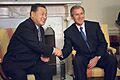 President George W. Bush and Prime Minister Yoshiro Mori shake hands during a meeting in the Oval Office - 2001
