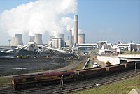 Ratcliffe-on-Soar Power Station with coal train, 26th March 2007.jpg