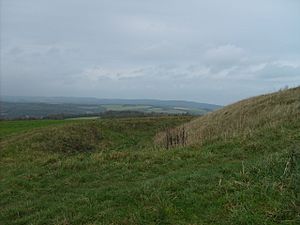 Rampart, ditch and bank of the Trundle Iron Age hillfort