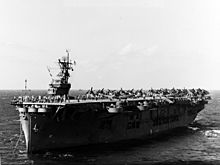 USS Suwannee (CVE-27) at anchor at Kwajalein atoll on 7 February 1944 (NH 106578)