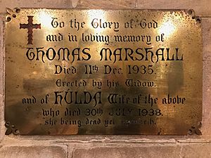 Brass plaque beneath the memorial stained glass windows in St Thomas', North Sydney