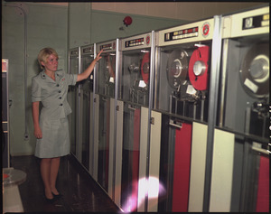 Camp Smith, Hawaii. PFC Patricia Barbeau operates a tape-drive on the IBM 729 at Camp Smith. - NARA - 532417