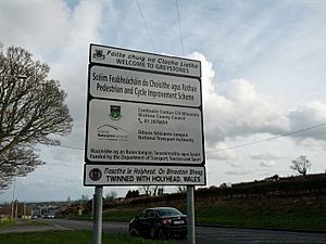 Sign showing Greystones, Ireland, as a twin city to Holyhead, Wales
