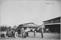 Townspeople of Ehrenburg, Ariz. Terr., greet a stranger in an automobile on his pioneer cross country tour. Saloon in ba - NARA - 513354