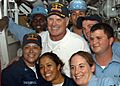 US Navy 040902-N-3019M-011 National Football League (NFL) Hall of Fame quarterback Terry Bradshaw poses with Sailors during a visit aboard the guided missile cruiser USS Port Royal (CG 73)