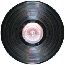 Most LPs were pressed in black vinyl with a paper label in the center of each side. However, colored and picture discs were also made