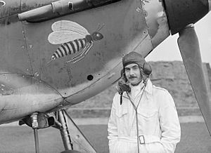 Pilot Officer A V "Taffy" Clowes of No. 1 Squadron standing by the nose of his Hawker Hurricane Mk I at Wittering, October 1940. CH1570