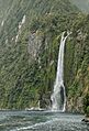 Tour boat 'Milford Wanderer' below Stirling Falls in Milford Sound