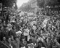 American military personnel gather in Paris to celebrate the Japanese surrender