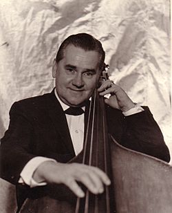 Carl Frederick Tandberg (1910-1988) circa 1940-1950 with his bass guitar.jpg