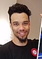 Dillion Brooks with picture for his Apartment (cropped)