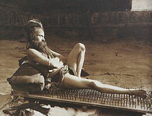 Fakir on bed of nails Benares India 1907