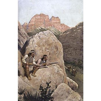 Hiding behind a rock, two Apaches plan to ambush a traveler.
