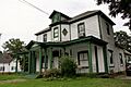 Holloway Street Historic District - White wooden house with green trim - Durham, North Carolina