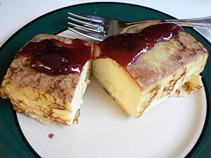 Japanese cheesecake with raspberry jam.jpg