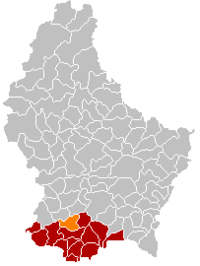 Map of Luxembourg with Reckange-sur-Mess highlighted in orange, and the canton in dark red