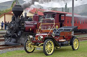 NZR D class locomotive No. 140 next to a vintage car on the Ferrymead Railway - October 2023 - 02