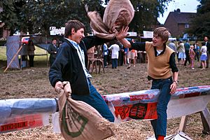 Pillow fight at English country fair, 1971