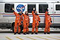 STS 135 crew wave farewell before the launch