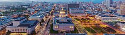 Aerial view of Civic Center at dusk in 2016, facing north. San Francisco City Hall is featured in the center.