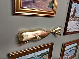 (John Pydynkowski) made this.. hand carved. a custom made to order. estimated to have ̩175 u.s.d. cost on gold leaf... sold for ̩350 u.s.d. Gold Whale