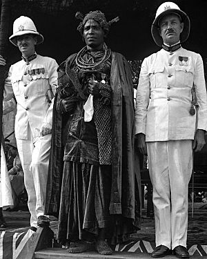 Oba Akenzua II with Earl of Plymouth and Sir John Macpherson, Governor-General of Nigeria.jpg