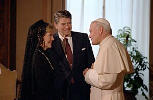 President Ronald Reagan and Nancy Reagan meet with Pope John Paul II at the Vatican Library