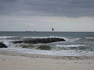Atlantic Beach New York jetty with US flag
