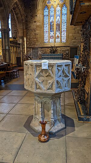Font in St Nicholas Church Leicester